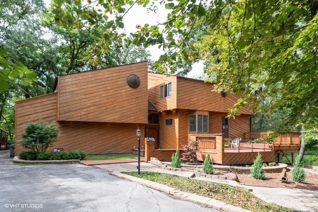 view of front of house with a wooden deck