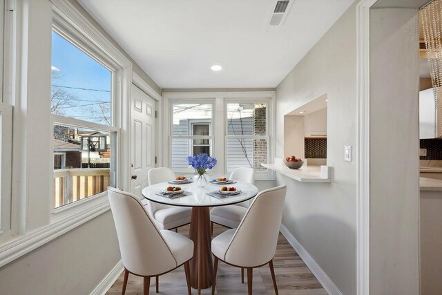 dining room featuring hardwood / wood-style flooring