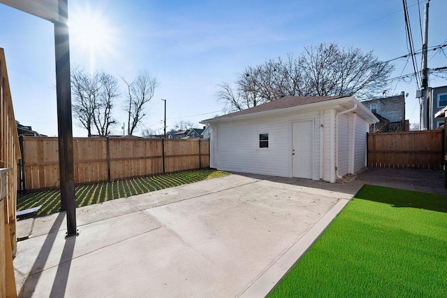 view of patio / terrace featuring an outbuilding