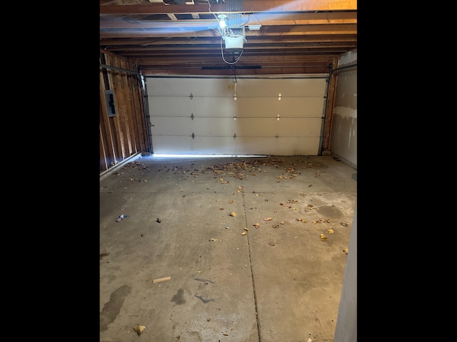 1009 Symphony Dr, Aurora, IL 60504 - garage with a garage door opener and electric panel