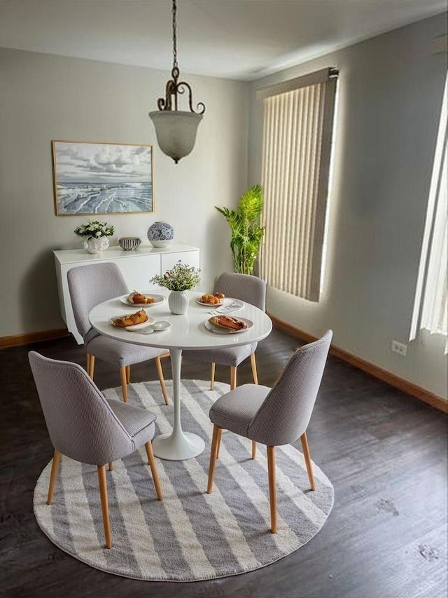 1009 Symphony Dr, Aurora, IL 60504 - dining room with baseboards and wood finished floors