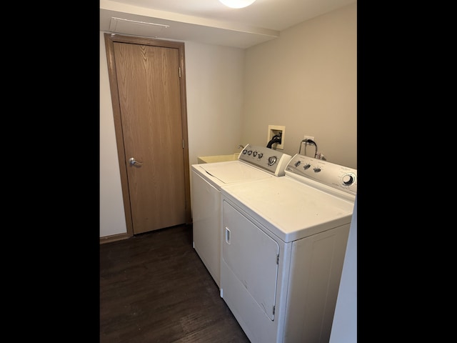 1009 Symphony Dr, Aurora, IL 60504 - washroom featuring washer and dryer and dark wood finished floors