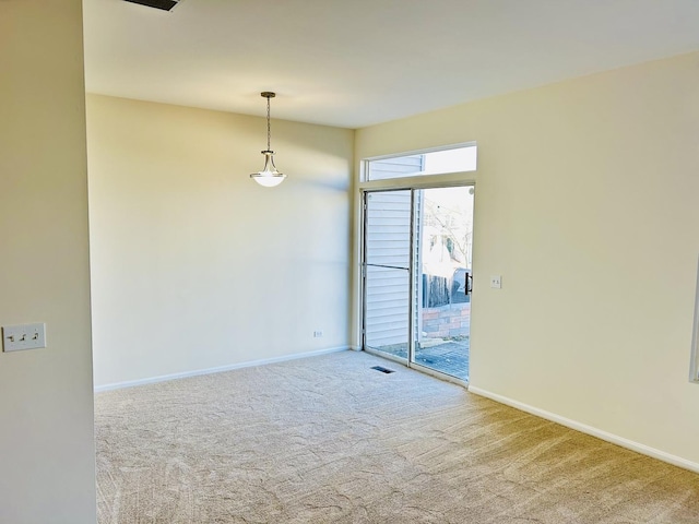 view of carpeted spare room