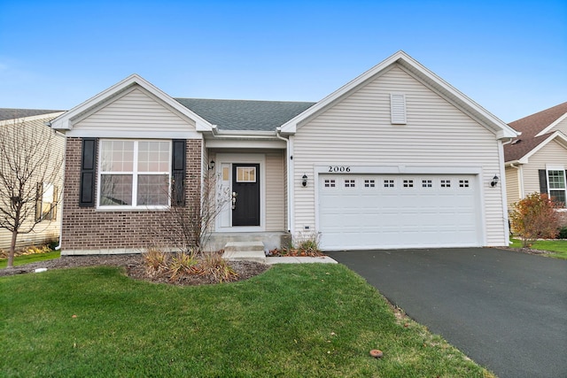 single story home featuring a garage and a front yard