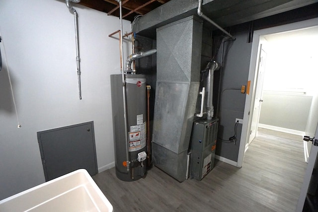 utility room featuring gas water heater