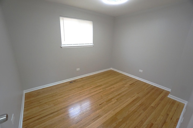 unfurnished room featuring light hardwood / wood-style flooring