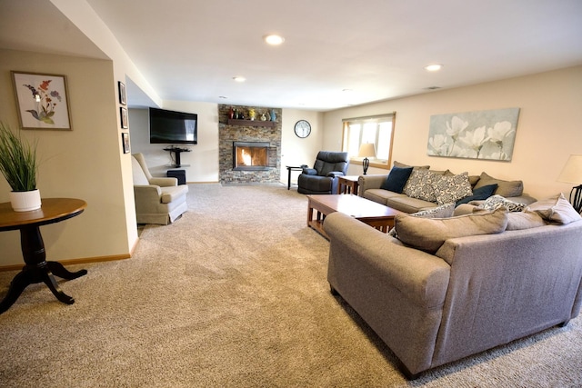 living room with light carpet and a stone fireplace