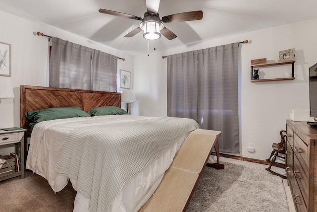 bedroom with ceiling fan and light colored carpet