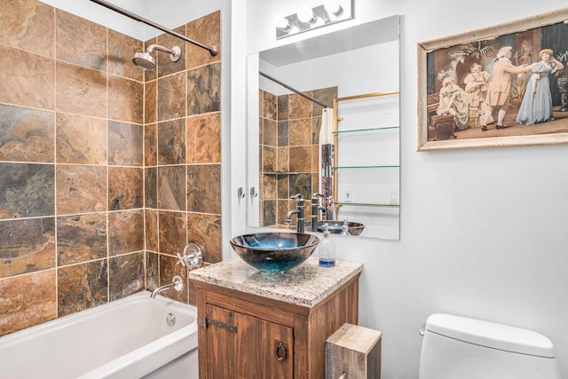 full bathroom with vanity, toilet, and shower / bath combo