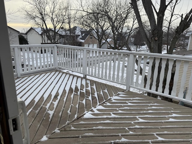 view of snow covered deck