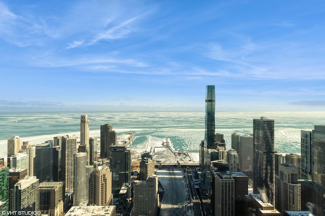 property's view of city featuring a water view