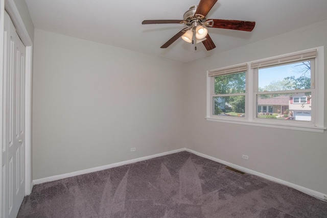 carpeted empty room with ceiling fan