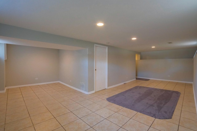 basement with light tile patterned floors