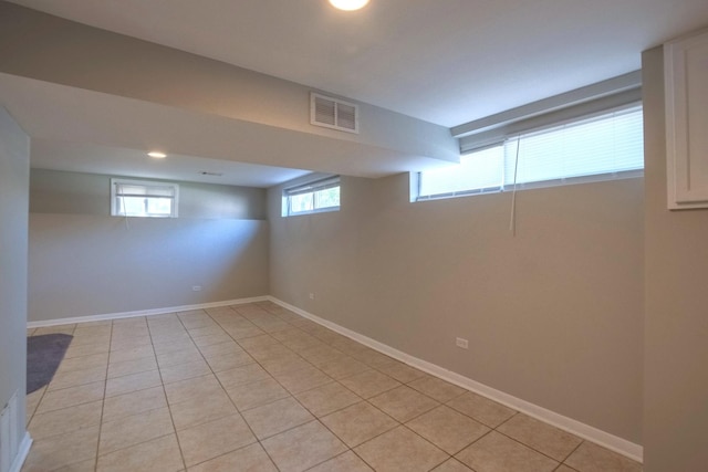 basement with light tile patterned floors