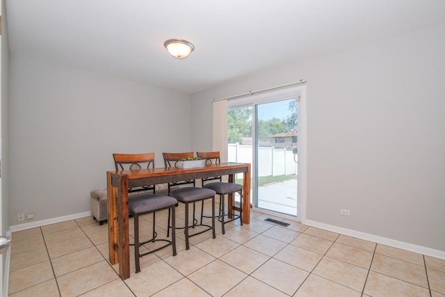 view of tiled dining space