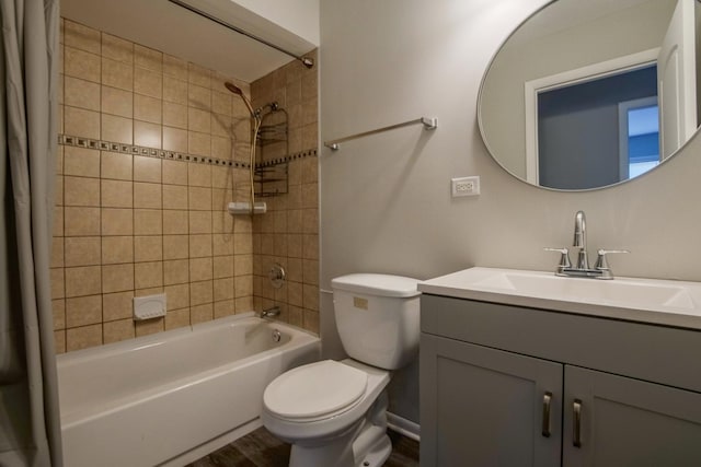 full bathroom with hardwood / wood-style flooring, toilet, vanity, and shower / bath combination with curtain