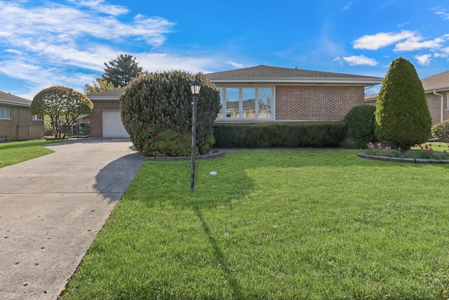 4850 N Crescent Ave, Norridge, IL 60706 - ranch-style house featuring a front yard, brick siding, a garage, and driveway