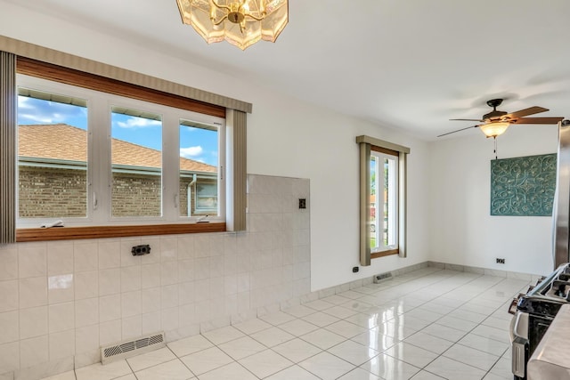 4850 N Crescent Ave, Norridge, IL 60706 - interior space featuring visible vents, tile patterned flooring, and ceiling fan with notable chandelier