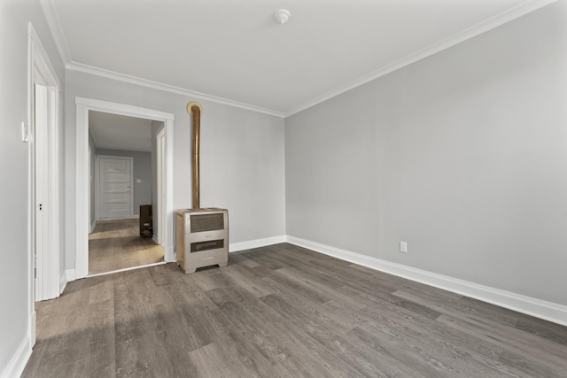 empty room with dark hardwood / wood-style floors and ornamental molding