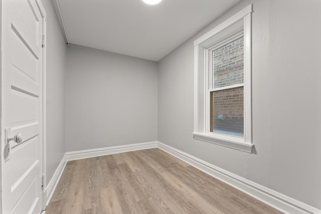 unfurnished room featuring light hardwood / wood-style floors