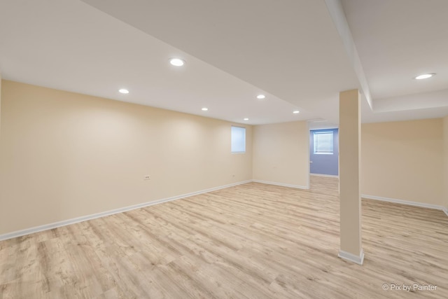 basement featuring light hardwood / wood-style floors