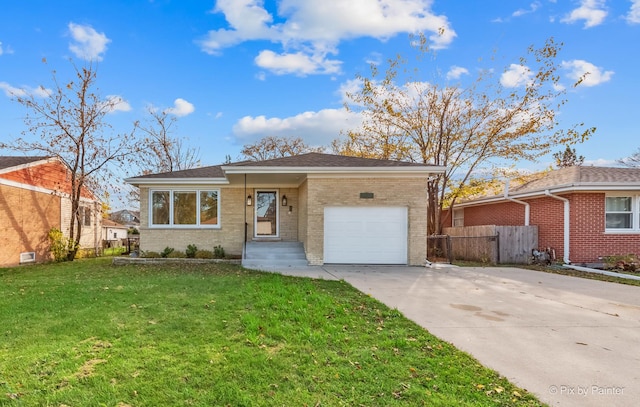 view of front of home with a garage and a front yard