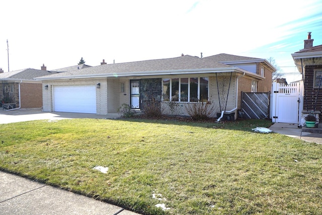 single story home with a garage and a front yard