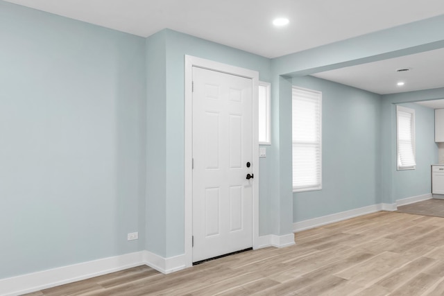 entrance foyer featuring light wood-type flooring