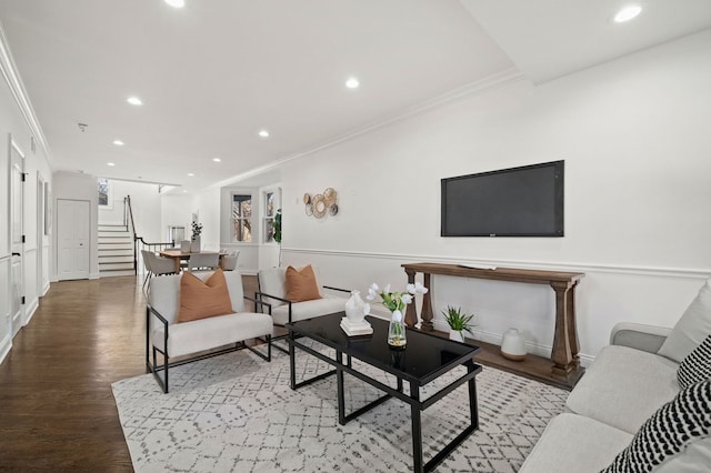 living room featuring crown molding and wood-type flooring