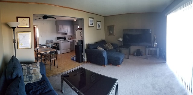 living room with parquet flooring and ceiling fan