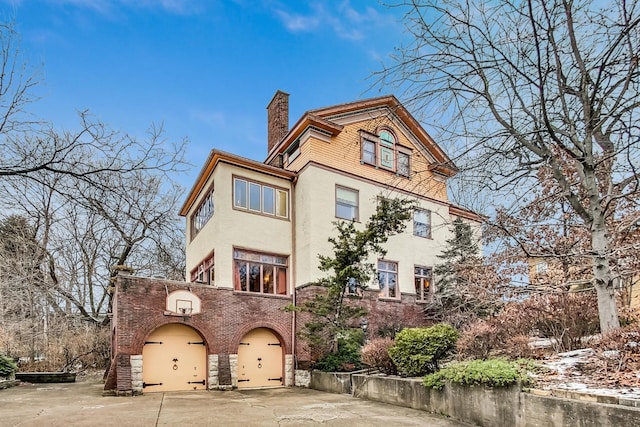 view of front of property with a garage