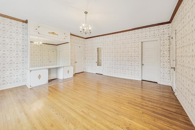 unfurnished bedroom with crown molding, a chandelier, and light hardwood / wood-style flooring