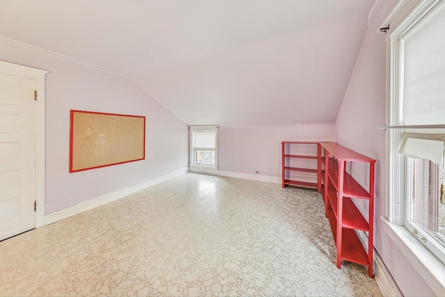 bonus room featuring lofted ceiling