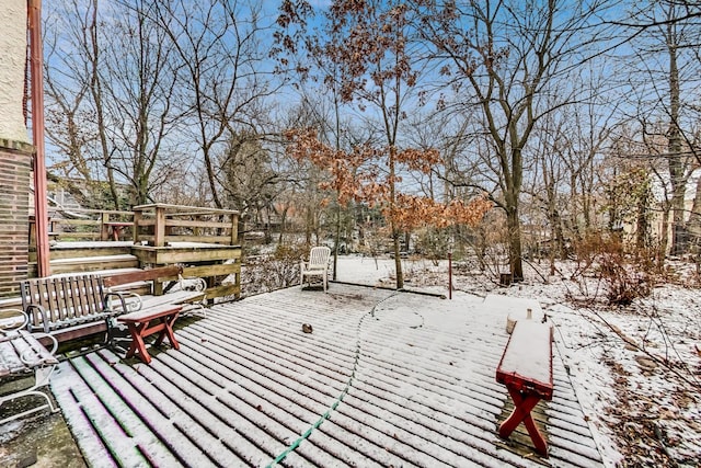 view of snow covered deck