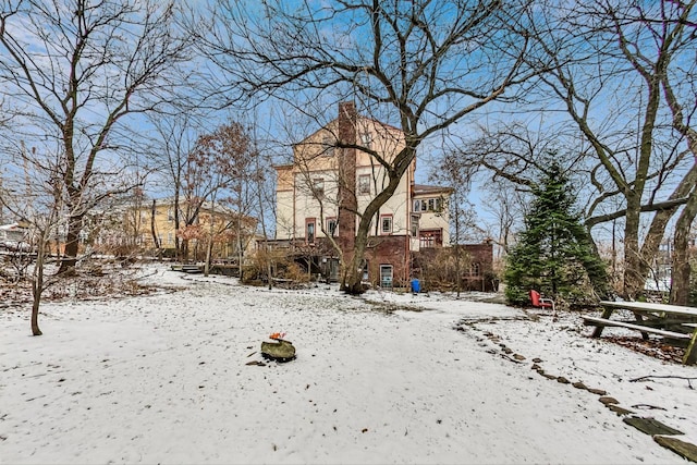 view of yard covered in snow