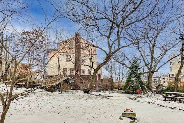 view of yard covered in snow