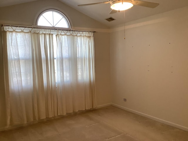 spare room with vaulted ceiling and ceiling fan