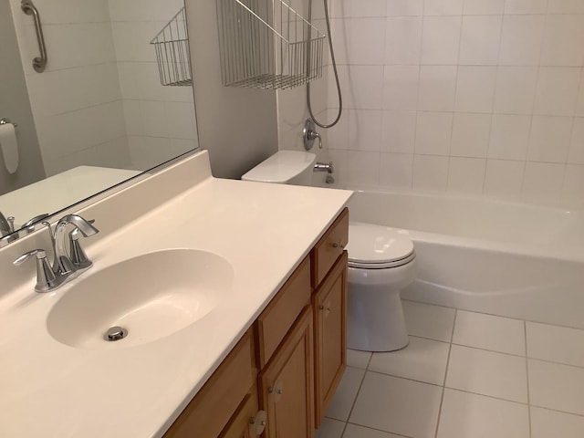 full bathroom with vanity, toilet, tile patterned floors, and tiled shower / bath