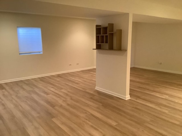 unfurnished living room with hardwood / wood-style floors