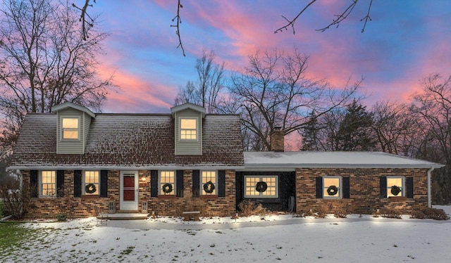 view of new england style home