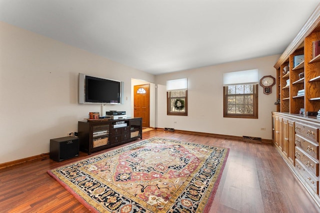 living room featuring dark hardwood / wood-style flooring