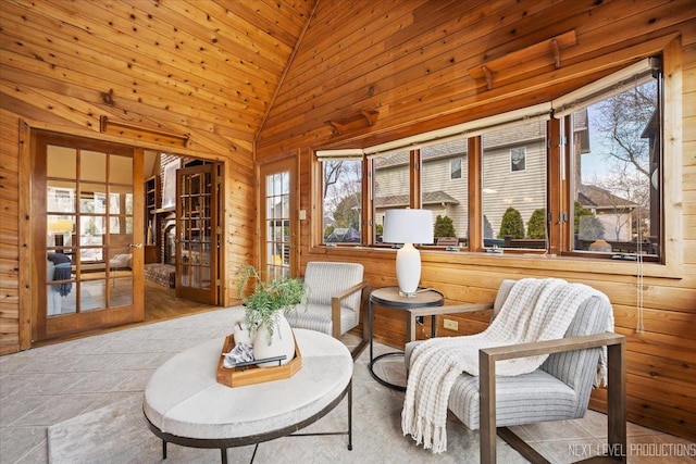 sunroom with lofted ceiling