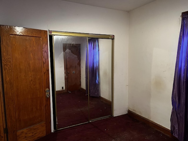 unfurnished bedroom featuring a closet