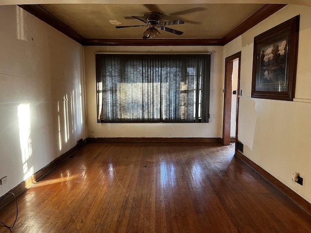 unfurnished room featuring ornamental molding, dark hardwood / wood-style floors, and ceiling fan