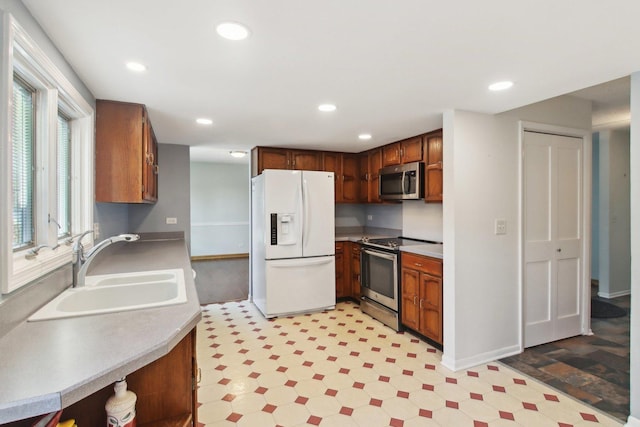 kitchen with sink and stainless steel appliances