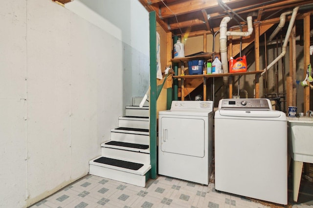 washroom with washer and clothes dryer