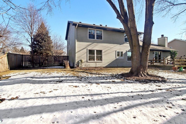 view of snow covered property