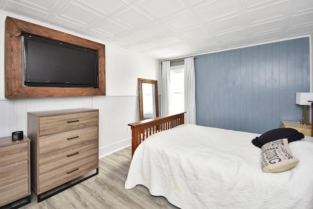 bedroom with light hardwood / wood-style flooring