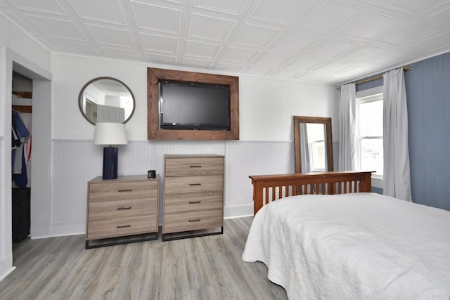 bedroom with light wood-type flooring