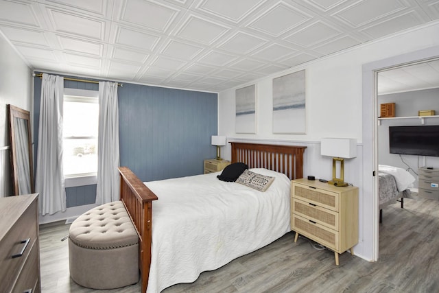 bedroom featuring hardwood / wood-style flooring